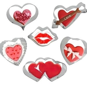 1 box of Q-Baker with 6 stainless steel cookie cutters.